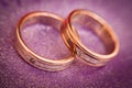 Two beautiful wedding rings with brilliants close up. Selective focus Royalty Free Stock Photo
