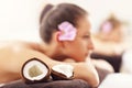 Two beautiful women getting massage in spa Royalty Free Stock Photo