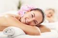 Two beautiful women getting massage in spa Royalty Free Stock Photo