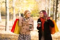 Two beautiful women having a relaxing conversation with coffee Royalty Free Stock Photo