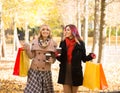 Two beautiful women having a relaxing conversation with coffee Royalty Free Stock Photo