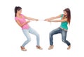 Two beautiful women pulling a rope Royalty Free Stock Photo