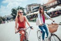 Beautiful women shopping on bike in the city Royalty Free Stock Photo