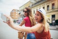 Two beautiful women shopping on bike in the city Royalty Free Stock Photo