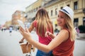 Two beautiful women shopping on bike in the city Royalty Free Stock Photo