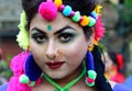 Portrait of a girl dressed to celebrate the famous festival of holi in kolkata, india
