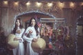 Two Beautiful women wearing Ao Dai Vietnamese