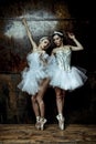 Two beautiful women wearing white tutu skirt Royalty Free Stock Photo