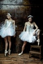 Two beautiful women wearing white tutu skirt Royalty Free Stock Photo