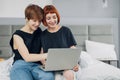 Two beautiful women working with a laptop computer Royalty Free Stock Photo