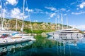 Two beautiful yachts shot in the sea against the mountain