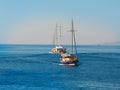 Two beautiful yachts in the waters of the Aegean Sea