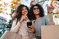 Two beautiful young stylish african women