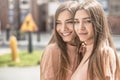 Two beautiful twins sisters spending time together.