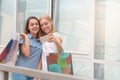 Two beautiful young women taking a selfie with their cell phone Royalty Free Stock Photo