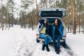 Two beautiful young women traveler traveling by car winter Royalty Free Stock Photo