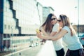 Two beautiful young women using smart phone Royalty Free Stock Photo