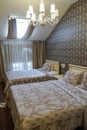 Two beds in a room in vintage style Royalty Free Stock Photo