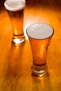 Two beer glasses, focus on first Royalty Free Stock Photo