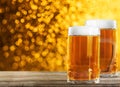 Two beer glasses on table Royalty Free Stock Photo