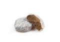 Two belgian truffles covered with powder isolated on white background Royalty Free Stock Photo