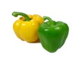 Two bell peppers, one green and one yellow isolated on white background Royalty Free Stock Photo