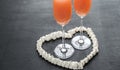 Two bellini cocktails inside of meringue heart Royalty Free Stock Photo