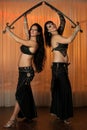 Two belly dancers preforming on stage Royalty Free Stock Photo