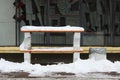 Two benches covered with snow, which stand one on the other. Royalty Free Stock Photo