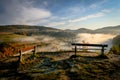 Two Benches in Misty Morning