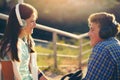 Two best friends, girl and boy, sit in the stair outdoor Royalty Free Stock Photo