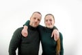 Two best friends hugging and smiling at the camera. How much more this friendship will last. Two are together since Royalty Free Stock Photo