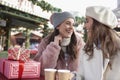 Two friends spending time on Christmas Market Royalty Free Stock Photo