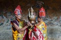 Two Bhutanese rich dressed young monks hold a Kundika bottle . Bumthang, central Bhutan. Royalty Free Stock Photo