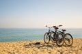 Two bicycles on the beach Royalty Free Stock Photo