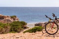 Two bicycles by a hidden beach in Ibiza, Balearic Islands. Spain Royalty Free Stock Photo