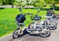 Two Bicycles in the spring park near the bench
