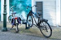 Two bicycles parked in front of a house wall Royalty Free Stock Photo