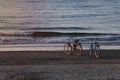 Two bicycles at sea sunset. Summer nature background with beautiful sky and sea. The Concept Of Active Recreation Royalty Free Stock Photo