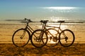 Two bicycles  on the beach Royalty Free Stock Photo