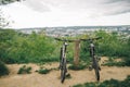 Two bicycles stand wth city view on background Royalty Free Stock Photo