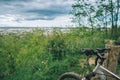 Two bicycles stand wth city view on background Royalty Free Stock Photo