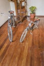 Two Bicylcles Parked at Interior Room