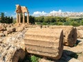 Two big columns in the Valley of the Temples of Agrigento; the temple of Dioscuri in the background