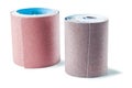 Two big rools of sandpaper isolated woodworking tools