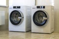 Two big washing machine in bathroom Royalty Free Stock Photo