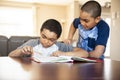 Two black brother child doing homework at home Royalty Free Stock Photo