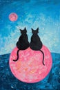 Two black cats siting on pink crescent moon with blue background - animal and night sky concept Royalty Free Stock Photo