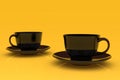 Two black coffee cups, on yellow background