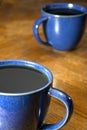 Two Black Coffees in Blue Mugs Royalty Free Stock Photo